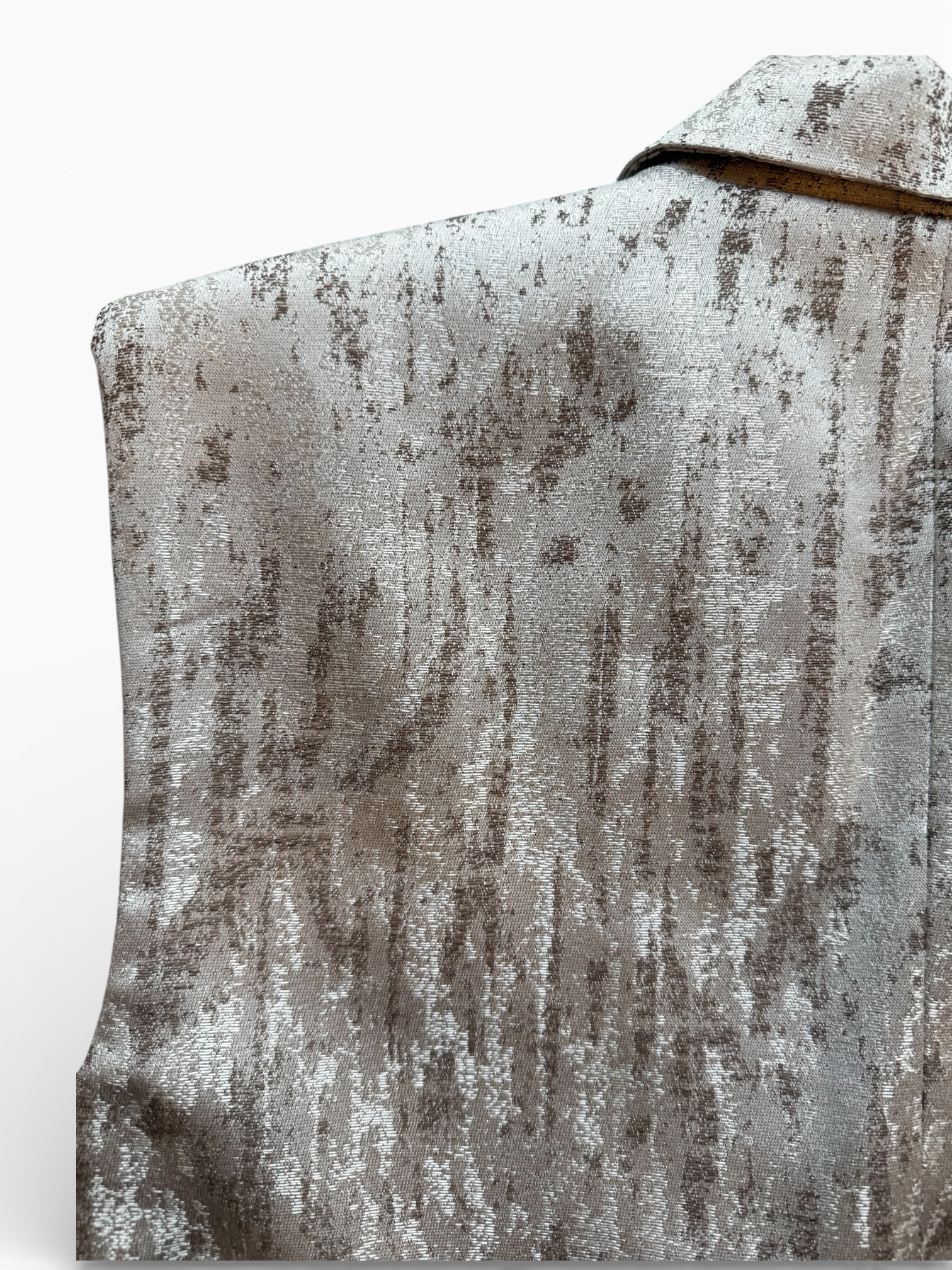 the-vest-jaspeado-cafe-y-blanco